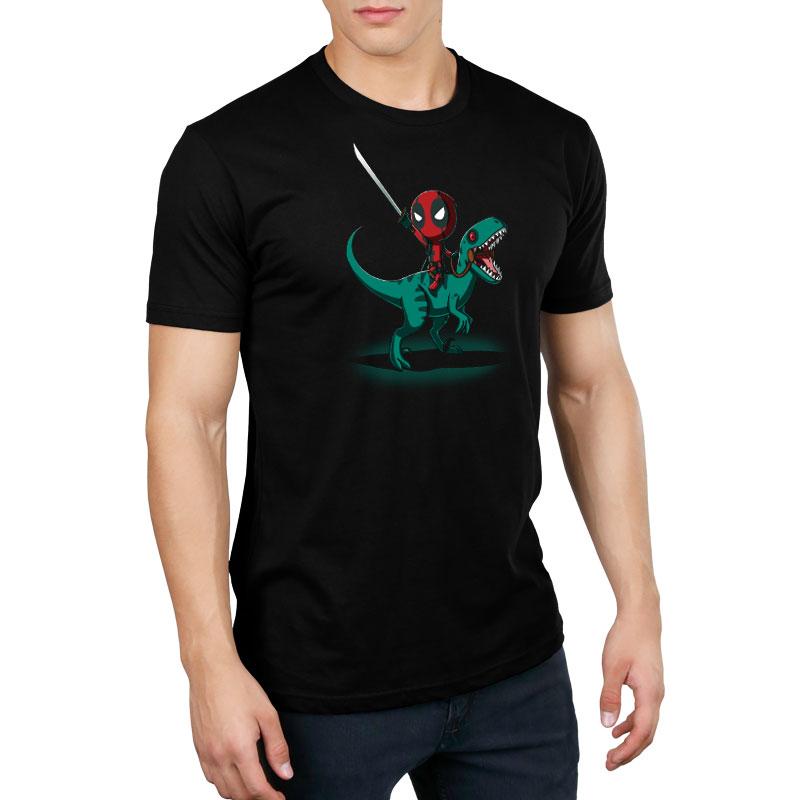 A man wearing a black Marvel - Deadpool/X-Men t-shirt featuring Deadpool on a Raptor!
