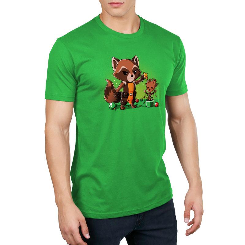 A man wearing an officially licensed green Marvel Rocket Around the Christmas Tree T-shirt with a raccoon on it.