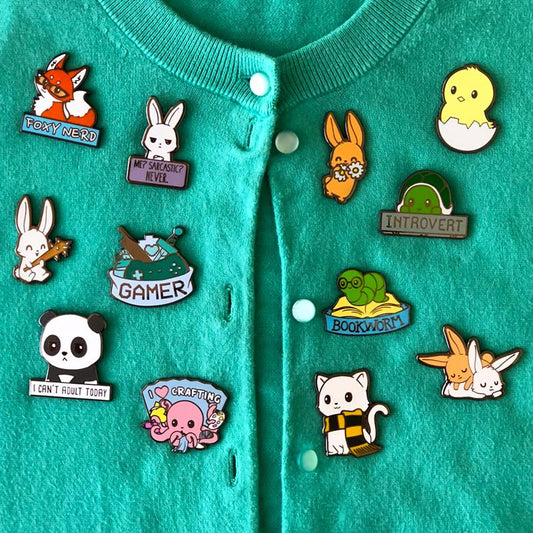 A green cardigan adorned with TeeTurtle's Bunny With Flowers Pin.