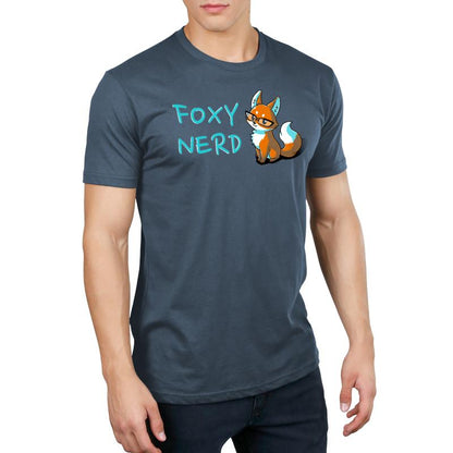 A person wearing an indigo T-shirt made of super soft ringspun cotton with an illustration of a fox and the words "Foxy Nerd" printed on the front from monsterdigital.
