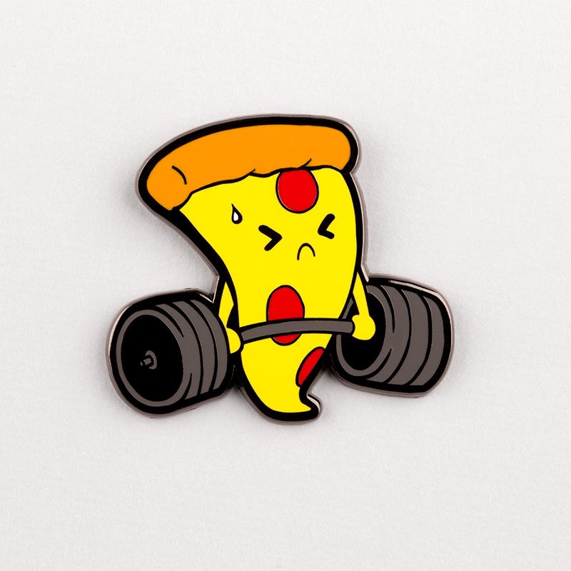 A TeeTurtle's "I Do It For the Pizza Pin" with a barbell on it, perfect for fitness enthusiasts and collectors of enamel pins.