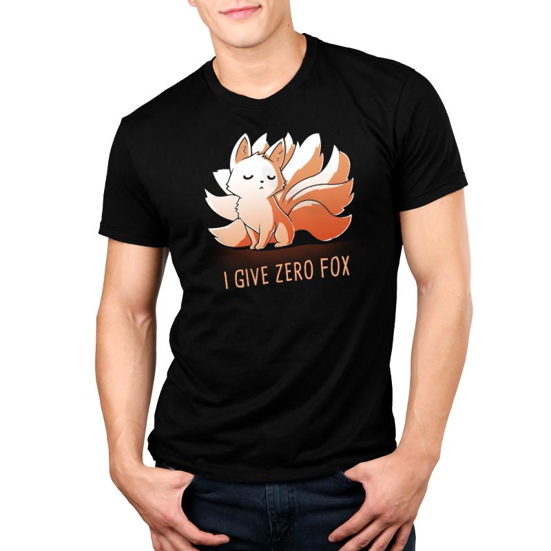 A man wearing a TeeTurtle Men's T-shirt that says "I Give Zero Fox".