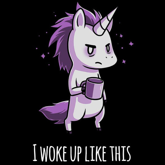 A purple unicorn with a sleepy expression holds a mug, perfectly capturing the essence of a morning unicorn. Captioned 