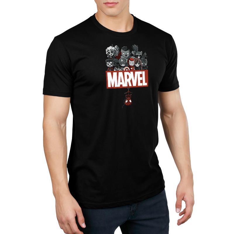 A man wearing a black T-shirt with the Marvel logo, representing Marvel Superheroes.