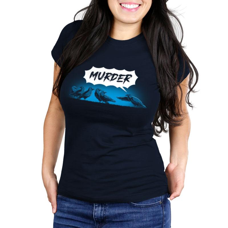 A woman wearing a navy blue Murder of Crows t-shirt from TeeTurtle.