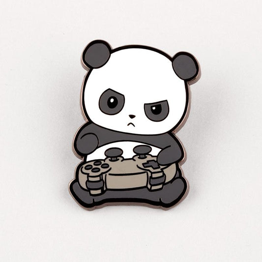 Enamel pin featuring Pew Pew Panda Pin, a TeeTurtle product, with tiny paws playing video game.