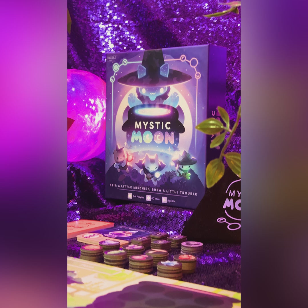 Mystic Moon: Base Game lifestyle video showing the game and components with a sparkly purple background, then highlighting a group of people playing the game