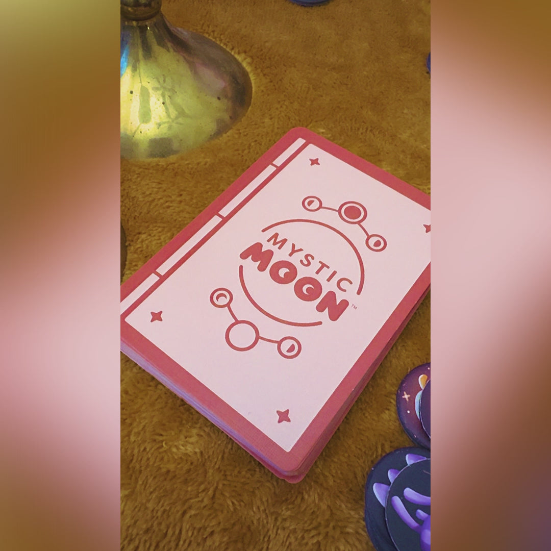 Mystic Moon: Base Game lifestyle video showing game elements on a table and people playing the game