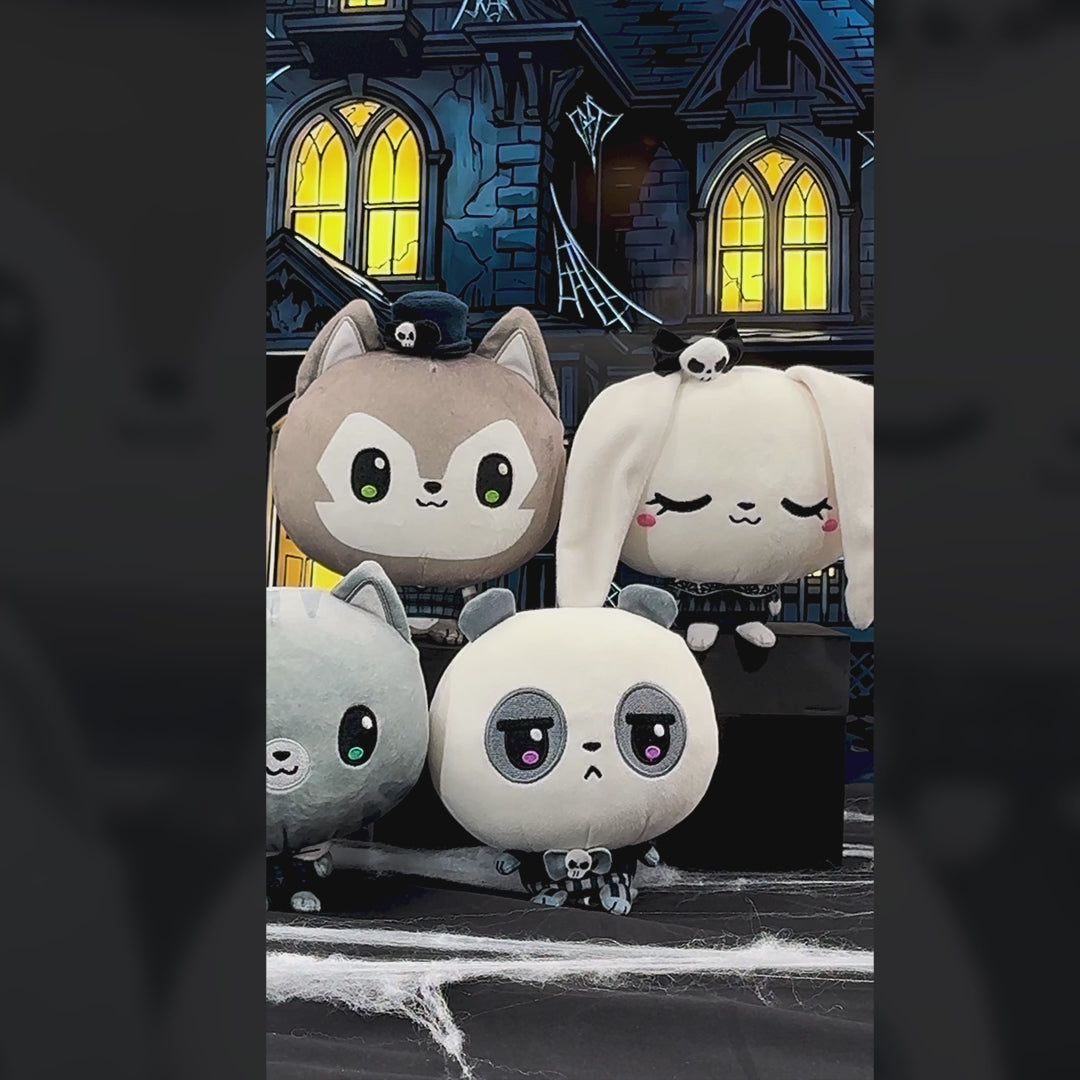 Five cute Haunted House Cloudheads in front of a haunted house