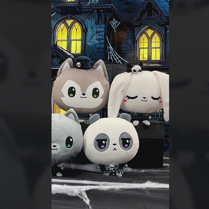 Five cute Haunted House Cloudheads in front of a haunted house