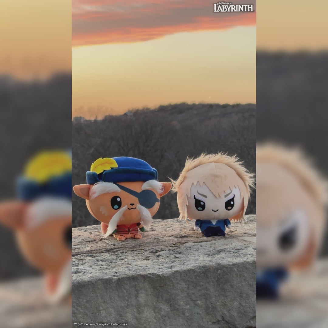 Video of Sir Didymus and Jareth Cloudheads on a rock with trees and an orange sky behind them. 