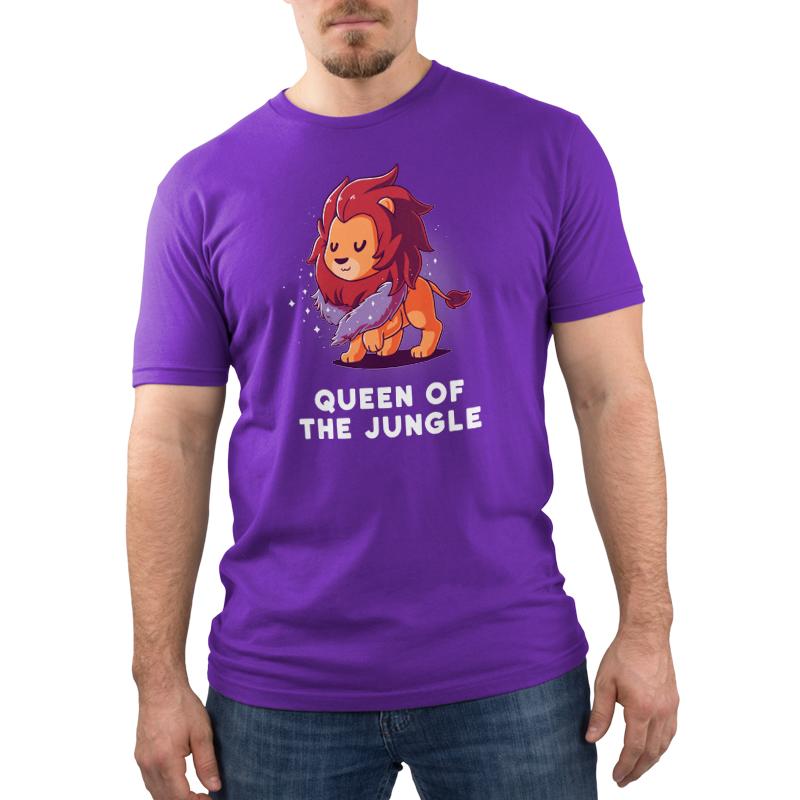 A man wearing a purple TeeTurtle T-shirt that says "Queen of the Jungle.