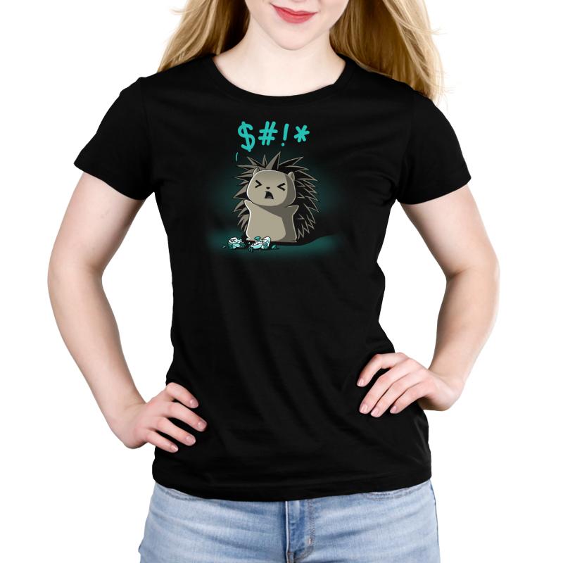 A person wearing a black monsterdigital Ragequit t-shirt featuring an angry cartoon porcupine and cursing symbols.