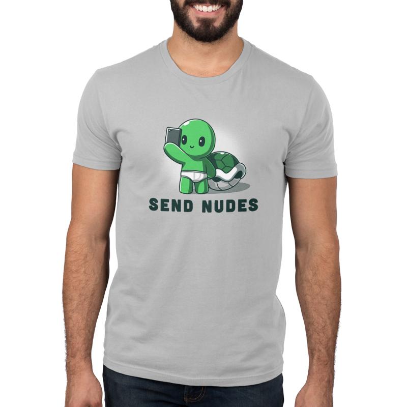 Premium Cotton T-shirt_green cartoon turtle character holding a smartphone, wearing white underwear, with "SEND NUDES" text below it, on a super soft ringspun cotton Unisex apparelby monsterdigital called Send Nudes.