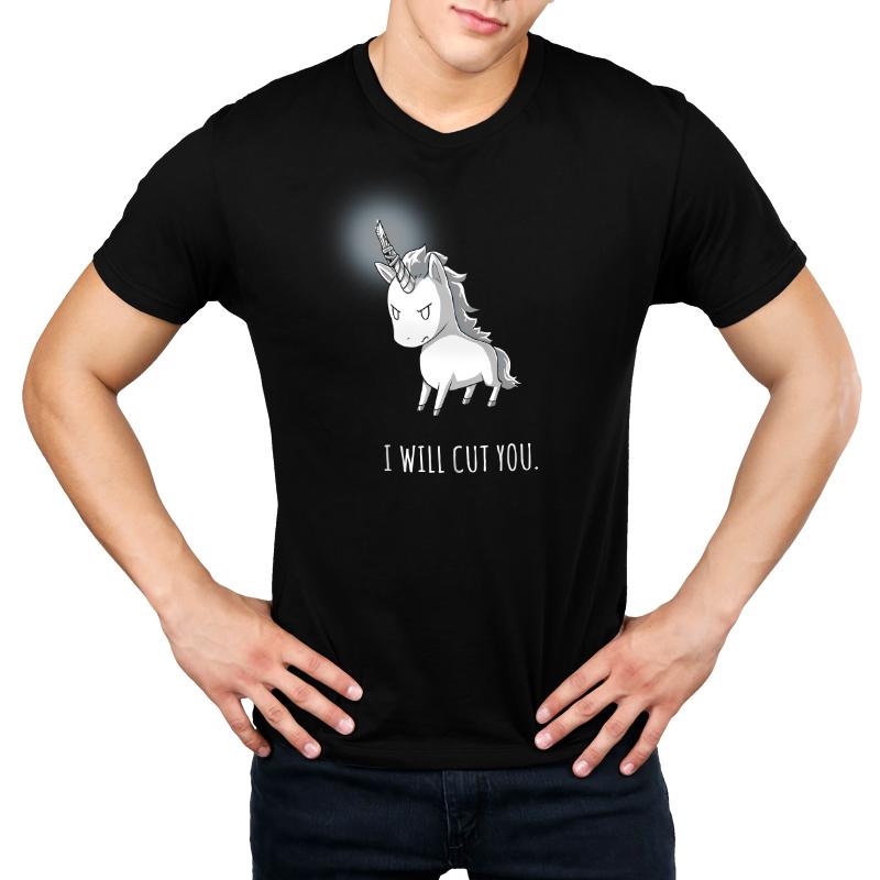 A man wearing a black t-shirt featuring the phrase "I will cut you" from TeeTurtle's Stabby the Unicorn (GLOW) collection.