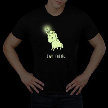 A man wearing a black t-shirt with Stabby the Unicorn (GLOW) by TeeTurtle.
