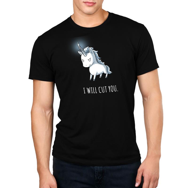 A man wearing a TeeTurtle Stabby the Unicorn black t-shirt with a menacing message.