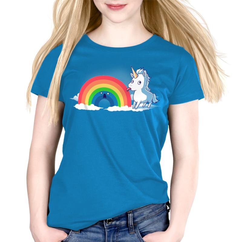 A woman wearing a cobalt blue Tasty Rainbow t-shirt with a unicorn and TeeTurtle.